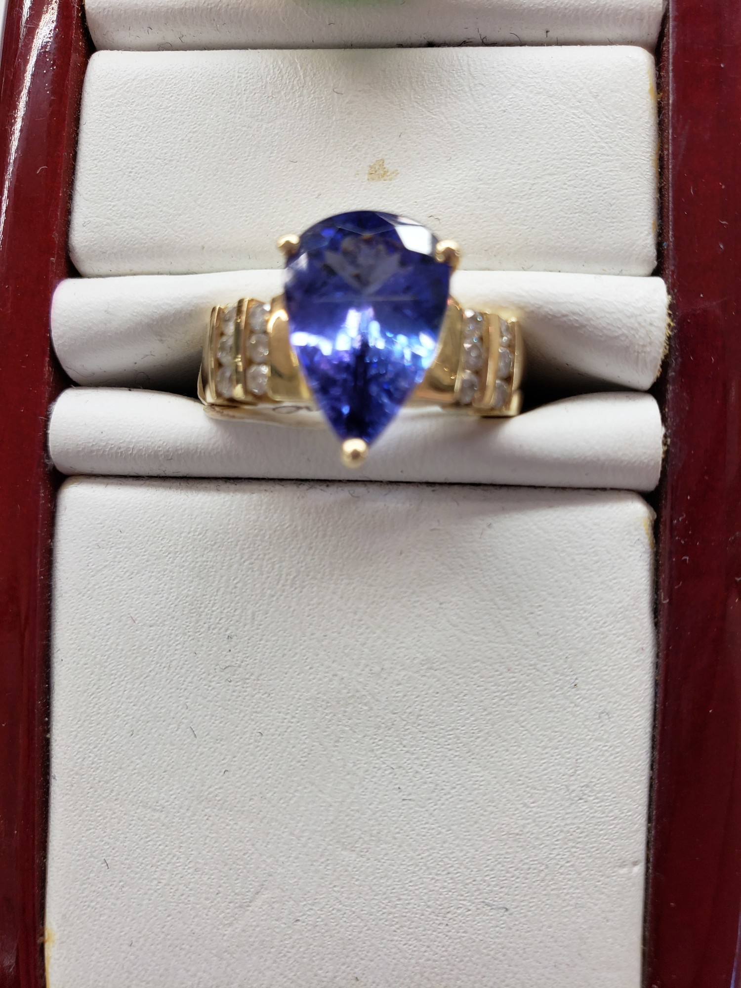 14ky 3.27ct Tanzanite and .24cts Diamond Ring
Size 7.25

Can be sized up or down for an additional fee
Pictures do not do the jewelry justice.
Photo ID required for pick up of online purchases. We will not ship jewelry purchases.

All jewelry has been checked by a Certified Gemological Institute of America (GIA) Accredited Jewelry Professional (AJP) and/or appraised by a certified local jeweler.