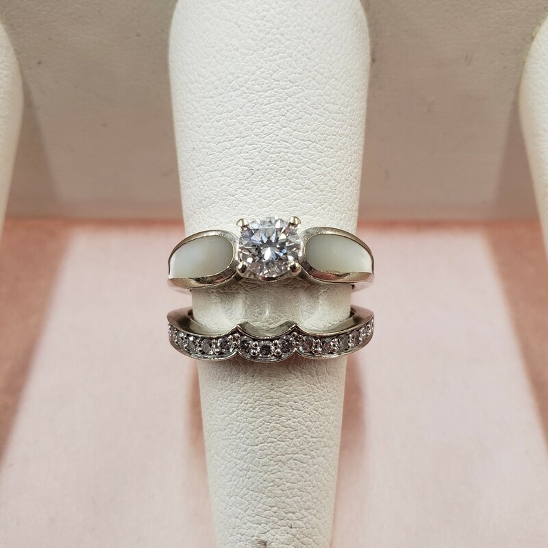 14k Kabana MOP Wedding Set. Originally purchased from Kokopelli in Ossipee, NH. Diamond specs: .70 center stone G color SI2 clarity. Also included is band designed to fit up against the ring and appraisal info on the center stone. Ring size is 7.5

Can be sized up or down for an additional fee
Pictures do not do the jewelry justice.
Photo ID required for pick up of online purchases. We will not ship jewelry purchases.


All jewelry has been checked by a Certified Gemological Institute of America (GIA) Accredited Jewelry Professional (AJP) and/or appraised by a certified local jeweler.