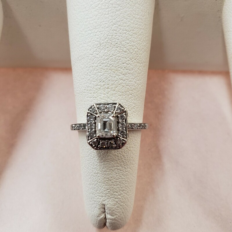 Diamond Ring Emerald Cut
Pretty vintage look size 5.5

Can be sized up or down for an additional fee

Pictures do not do the jewelry justice.

Photo ID required for pick up of online purchases. We will not ship jewelry purchases.

All jewelry has been checked by a Certified Gemological Institute of America (GIA) Accredited Jewelry Professional (AJP) and/or appraised by a certified local jeweler.