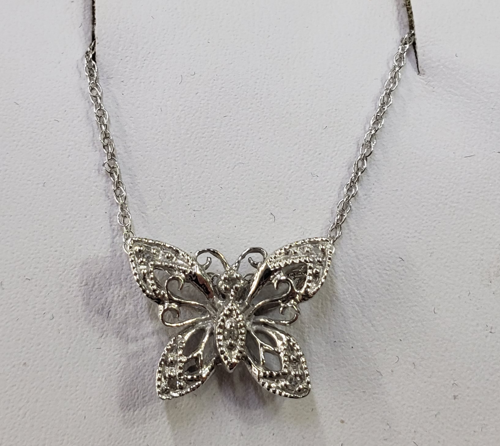 10k White Gold Butterfly Necklace

Pictures do not do the jewelry justice.
Photo ID required for pick up of online purchases. We will not ship jewelry purchases.

All jewelry has been checked by a Certified Gemological Institute of America (GIA) Accredited Jewelry Professional (AJP) and/or appraised by a certified local jeweler.