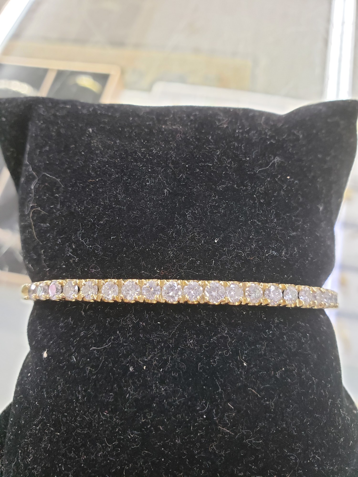 Diamond Bangle Bracelet
2ct total weight set in 14k yellow gold
H-I color SI1-2 Clarity

Pictures do not do the jewelry justice.
Photo ID required for pick up of online purchases. We will not ship jewelry purchases.

All jewelry has been checked by a Certified Gemological Institute of America (GIA) Accredited Jewelry Professional (AJP) and/or appraised by a certified local jeweler.