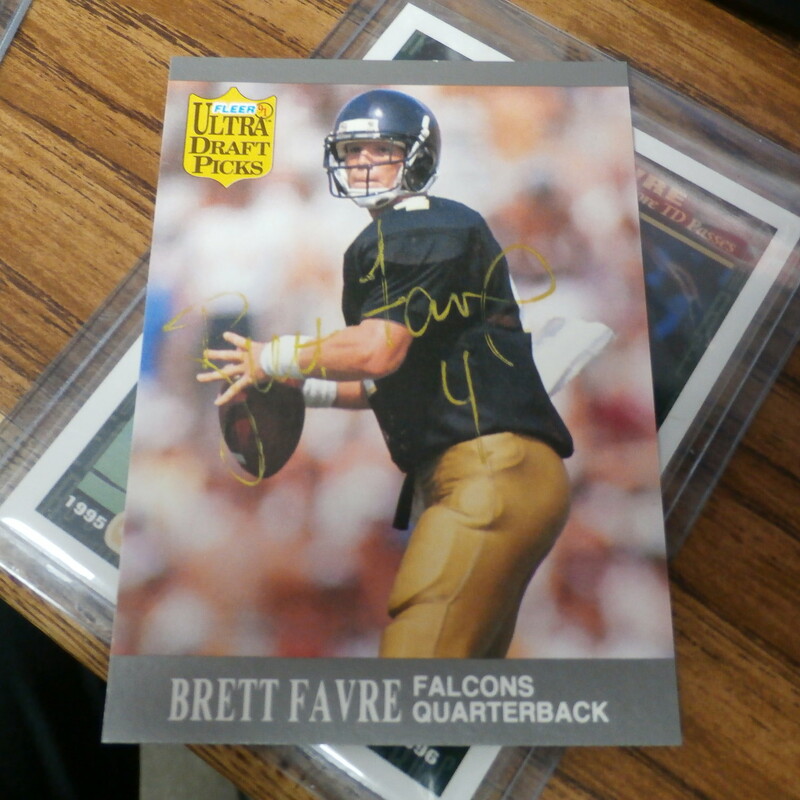 Brett Favre Green Bay Packers Lot of 3 cards - On Card Autographs (#25633)
Rating: (see below) 3 - Good Condition
Team: Green Bay Packers
Player: Brett Favre
Brand: Upper Deck, Fleer, Donruss
Size:   20pt
Color: multi
Material: n/a
Style:  #1. 1996 Upper Deck #57 On Card Autograph (NOT AUTHENTICATED); #2. 1991 Fleer #283 on card autograph (NOT AUTHENTICATED); #3. 2000 Bowman #BS-1 (1188/4091) passing yards short print
Condition: - 3- Good condition: these 3 cards are not mint condition, they all have minor flaws, white showing on the sides; some corners are slightly rounded; the Donruss has white marks on the edges and corners and some of the paper is coming off the back corners;  the Fleer is sharp but has small white marks on all the corners (the autograph is in gold pen and is faded and worn looking also its not authenticated; the upper deck is clean and sharp corners with autograph in sharpie- not autheticated   (SEE PHOTOS)
Our cards ship in a poly mailer; penny sleeves; top loader; multi card lots ship in a thick loader together;
Shipping: FREE
Item # 25633