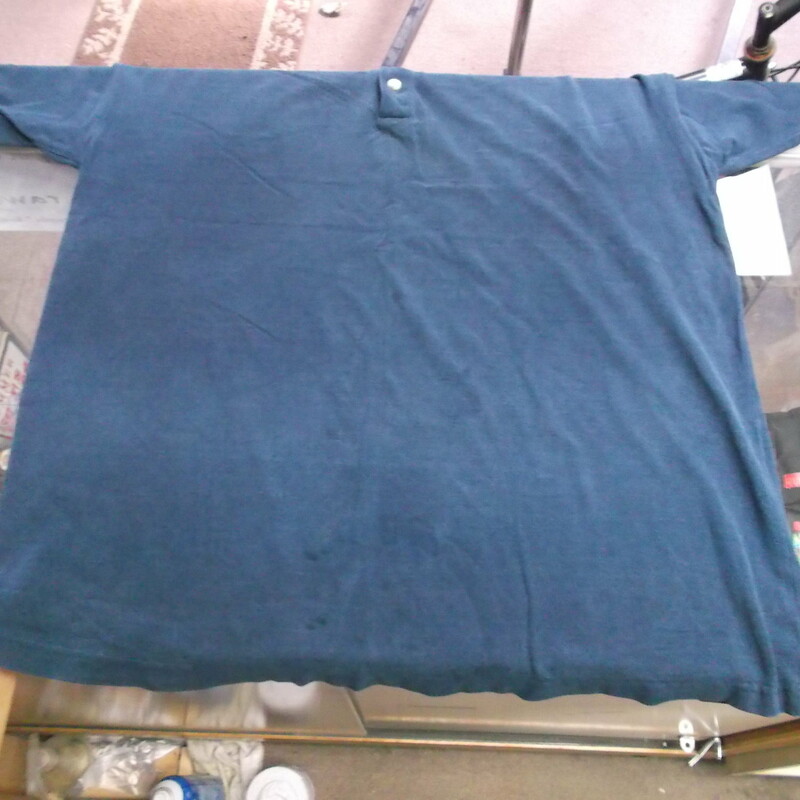 Columbia Mens Partial Button Short Sleeve Shirt Size 2XL Heavy Cotton Blue #7719
Rating:   (see below) 4 - Fair Condition
Team: N/A
Player: N/A
Brand: Columbia
Size: 2XL - Men's(Measured Flat: chest 25\"; length 32\") 
measurements are from armpit to armpit and from shoulder to hem; - please check measurements. 
Color: Blue
Style: Short sleeve partial button shirt
Material: 100% Cotton
Condition: - Fair Condition - wrinkled; Material is faded and discolored; Minor pilling and fuzz; Noticeable stains throughout; Two holes on the right side of the buttons; Bottom is curled; Staining on the sleeves; Definite signs of use; Material feels coarse(See Photos for condition and description)
Shipping: $4.90
Item #: 7719