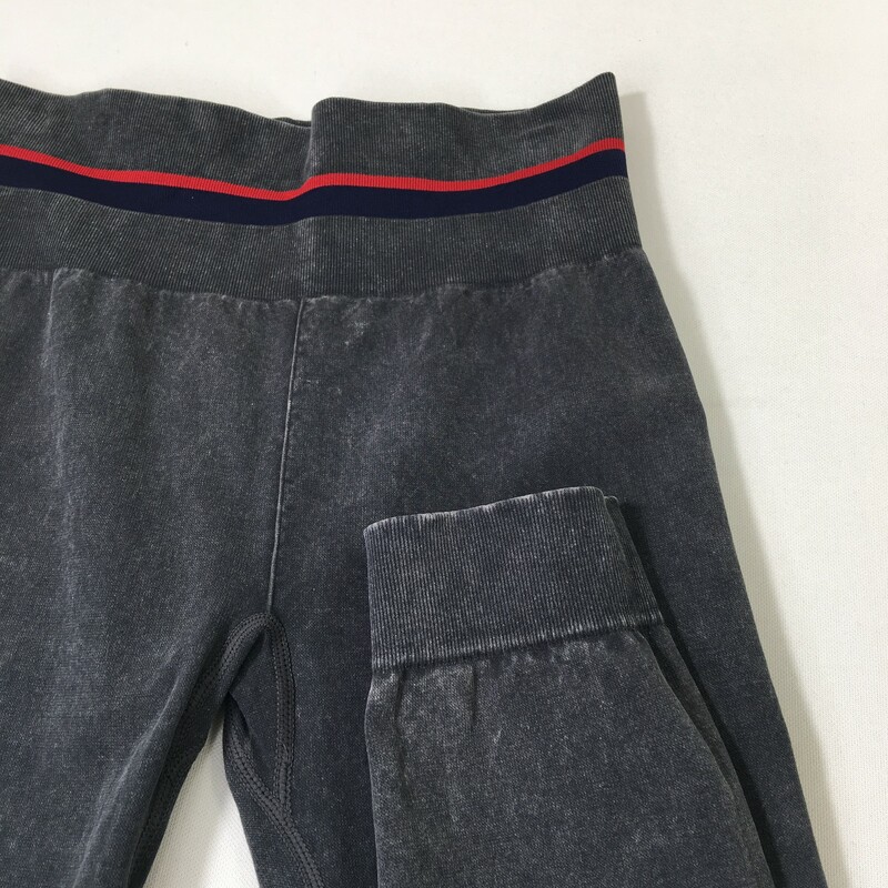 100-818 Champion, Grey, Size: Medium washed dark grey leggings with blue and red stripe at top 76% cotton 20%nylon 4% spandex  good