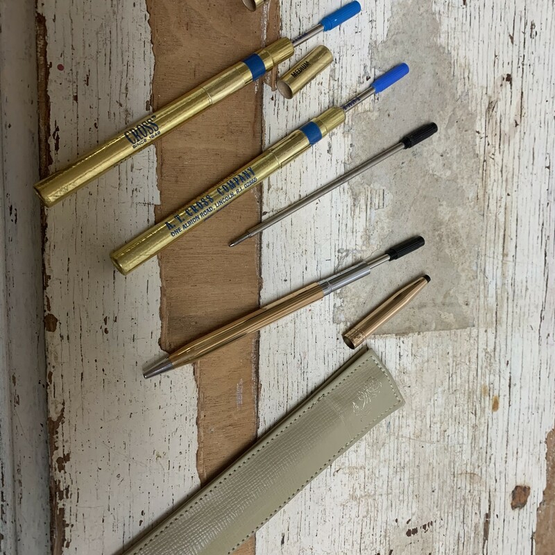 Vintage 1/20 14k yellow gold plated pen. Comes with original cowhide pen purse made by Cross.<br />
Have two refill inks in blue and one in black. Black ink doesn't have a cover. I don't know how much ink is in each container, but they all write.<br />
Pen measures approx. 5 1/4'' long, 1/4'' diameter.<br />
Pen purse measures approx. 5 1/2'' x 1 1/4''.<br />
Overall in a good vintage condition. Have a light vintage wear. Please make sure to look at all the pictures for a closer visual.<br />
Please note that this item is vintage and you will experience vintage wear. You will receive item as shown in the pictures.<br />
Thank you.