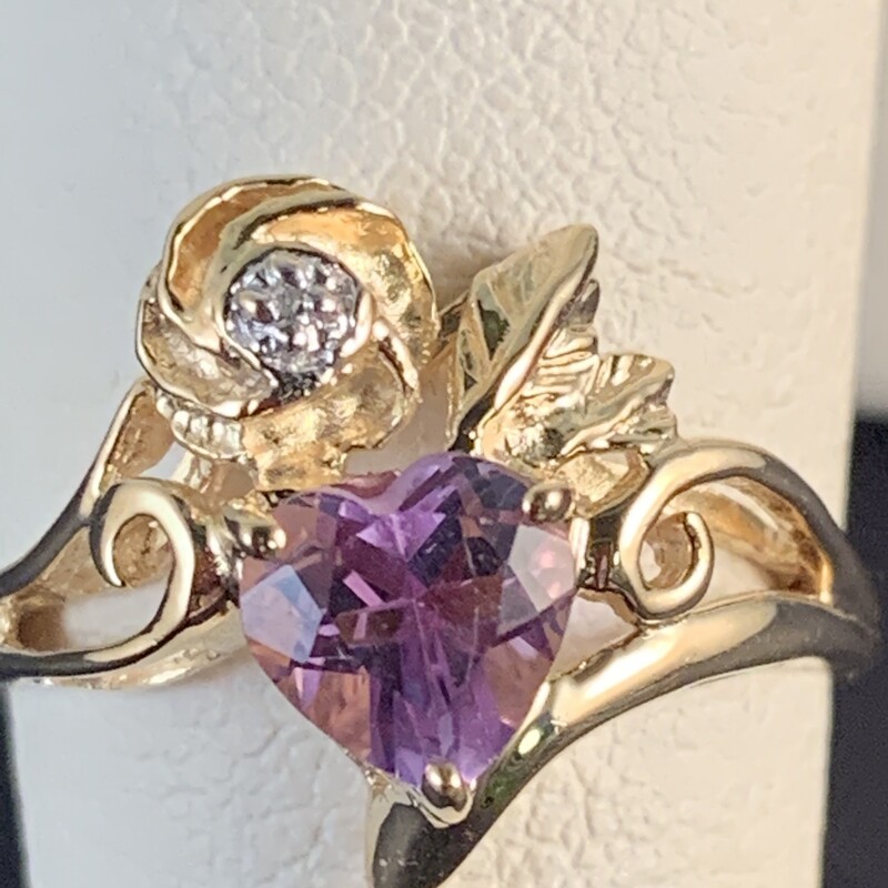 Heartshape Amethyst and Rose Design with Diamond Ring<br />
Size 7<br />
14 Karat Yellow Gold<br />
$225<br />
<br />
Can be sized up to 7.5 or down to 5