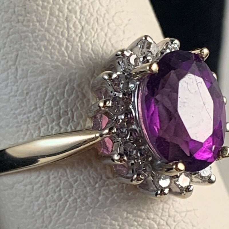 Ladies Ring 9 x 7mm Amethyst with Diamond Halo<br />
Diamonds total .36 carats.<br />
14 karat yellow gold<br />
Size 7.75<br />
$715<br />
<br />
* Can be sized up or down 2 sizes
