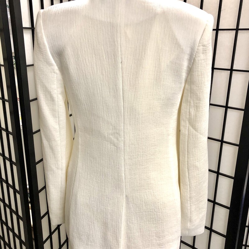 HALSTON HERITAGE  CRINKLED IVORY SLACK SUIT - SIZE 2/4.<br />
This has a crinkled style material, ivory in color exposing  a look of understated classic elegance.  The jacket has a elongated V-neck, 2\" wide lapels,  one button closure, 2 unique large front pocket with a   7.5\" slit in back.. Estimated measurements:  length = 28\", sleeve length = 25, fully lined.  Inside label reads size XS with additional composition label of viscose, nylon .and poly.  High rise slacks  of course have same composition of viscose, nylon and poly, fully lined, a wide leg which elongates the leg yet so very stylish belted effect at waist .with belt loops, concealed back zipper, 2 hook closures, , generous material sash belt which allows your choice of tie  whether it be a bow or<br />
simple tie (please refer to pictures).. Estimate measurements:  hip = 29\", waist = 27\", rise = 14\", leg opening = 28\".  Inside tag reads a size 4.  Halston's design principles are truly on display.  Can be worn with a bold brooch, exquisite scarf or shawl and certainly a multitude of pearls.  So easy to enjoy.