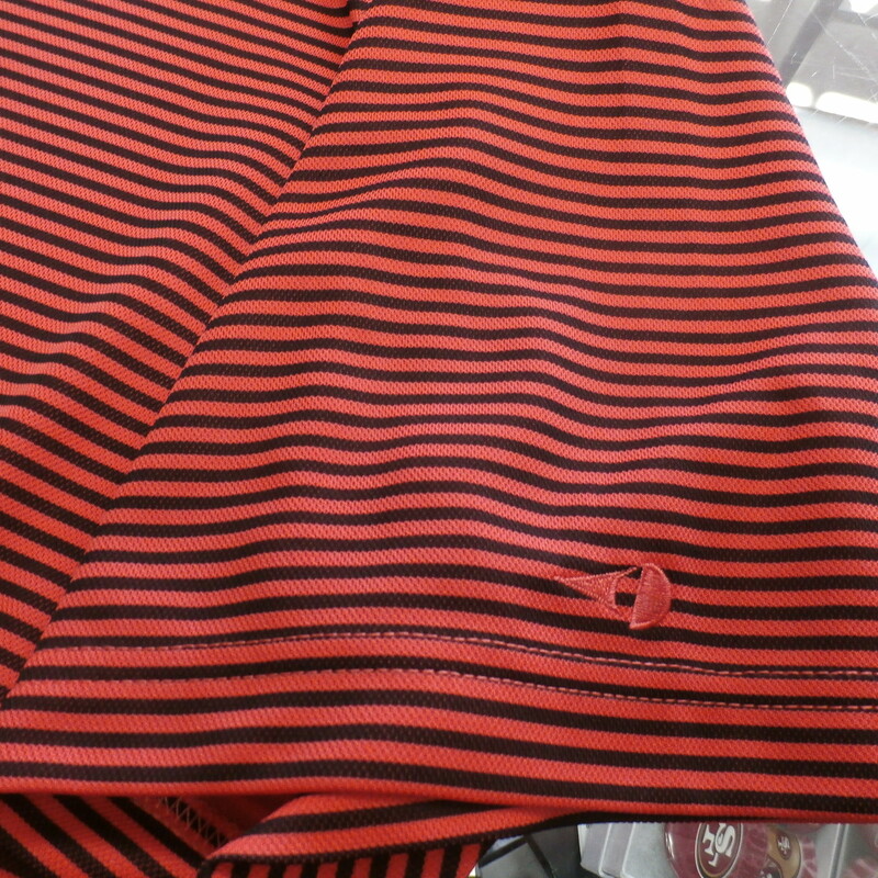 Grand Slam Men's Striped Polo Shirt Size Medium Red Polyester #25551
Rating: (see below) 2 -  Great Condition
Team: N/A
Event: N/A
Brand: Grand Slam
Size: Men's - Medium(Measured Flat: Across Chest: 21\"; Length 28\")
Measured Flat: armpit to armpit; top of shoulder to bottom hem.
Color: Red
Style: Short sleeve polo; striped
Material: 100% Polyester
Condition: 2 - Great Condition - wrinkled; material looks and feels great; clean and crisp; lightly used; no stains rips or holes
Item #: 25551
Shipping: FREE