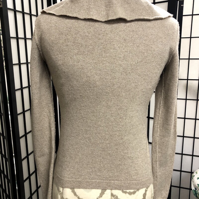 MOSCHINO  'CHEAP & CHIC'   LONG SLEEVE SWEATER - SIZE USA 6  (I 40 ).  This is a pullover style, exquisite ruffled collar , V-necked with long sleeves. This is a neutral beige color with slight glitter accents.  Composition =  37% virgin wool, 27% nylon, 23% rayon and 9% cashmere.  Condition - very good with absolutely no visible signs of wear.  Could be easily worn with a smart pencil skirt, tailored slacks or an unusual lovely skirt such as one that Zac  Posen presented which I took the liberty of showing  in enclosed pictures.  Please remember - designer sizes can be inconsistant - please be sure of your size in designer line.