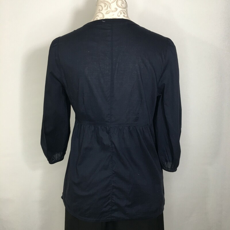 100-602 No Tags, Blue, Size: Medium
Navy blue top with embellishing  no tag