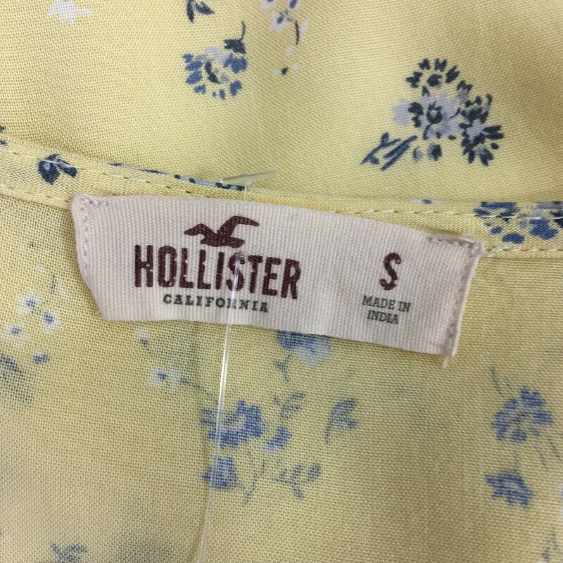 105-249 Hollister, Yellow, Size: S
yellow wrap dress with blue flowers 100% viscose  good condition