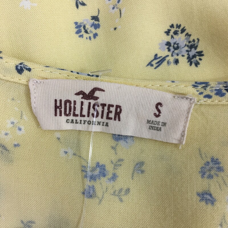 105-249 Hollister, Yellow, Size: S<br />
yellow wrap dress with blue flowers 100% viscose  good condition