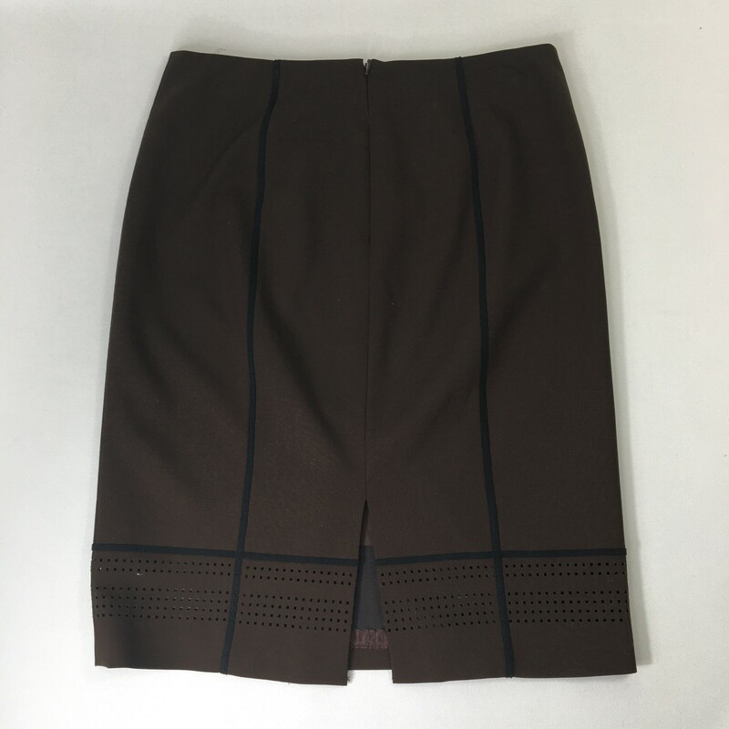 100-1094 Worth, Brown, Size: 4 brown skirt with black lines and square holes on the bottom 95% wool 5% elastane  good