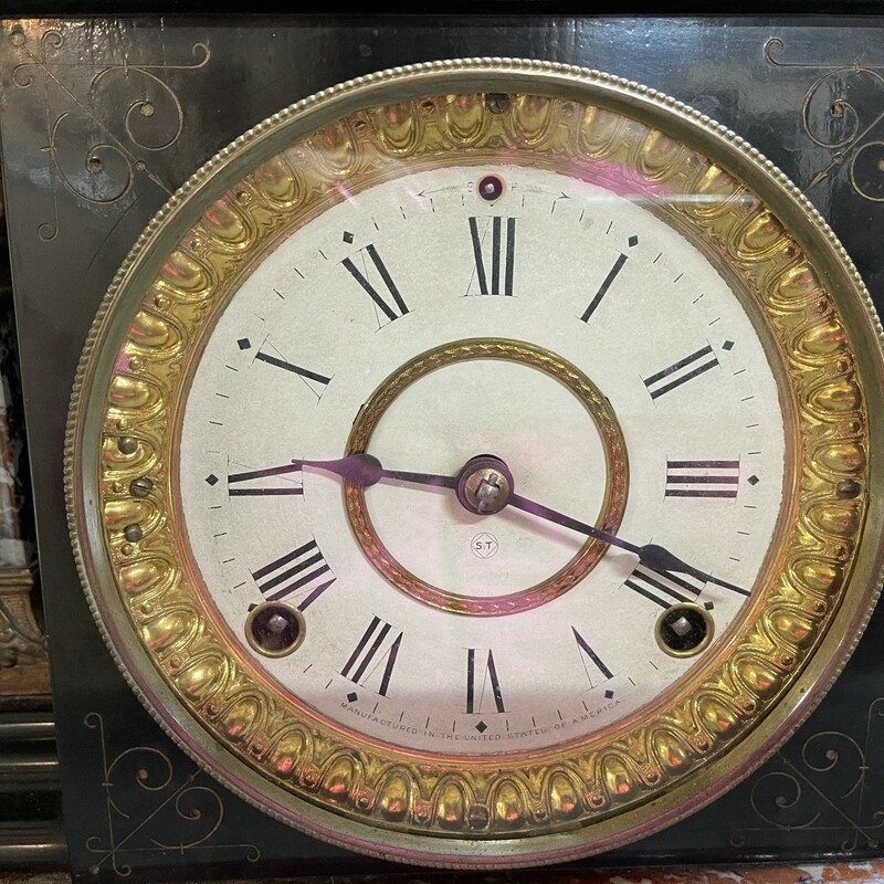Seth Thomas mantle clock finished in a beautiful faux marble. This 1880â€™s eight day wind with key; is adorned with lion heads on either side. Measures at 16w x 6 1/2d x 11t. Beautiful condition!