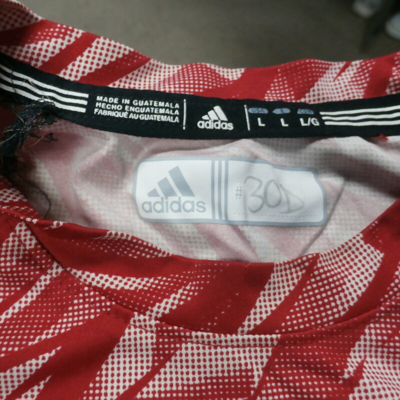 Louisville Cardinals Men's adidas shirt red design size Large polyester #27306
Rating: (see below) 4- Fair Condition
Team: Louisville Cardinals
Player: Team
Brand: adidas
Size: Men's Large- (Measured Flat: Across chest 21\"; Length 29\")
Measured Flat: underarm to underarm; top of shoulder to bottom hem
Color: red
Style: short sleeve; screen pressed; \"AlL IN all the time\"
Material: 100% polyester
Condition: 4- Fair Condition - wrinkled; noticeable yellow discoloration stains in the fabric that blends in well with the design; pilling and fuzz; logo is worn and faded; player numbers are written on the tags of all these shirts; the neck tag area on all these shirts are fraying and balling up; if you buy one we will pick the next one and ship it; all have similar flaws;
Item #: 27303; 27304; 27305; 27306; 27307
Shipping: FREE