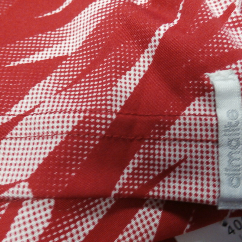 Louisville Cardinals Men's adidas shirt red design size Large polyester #27306<br />
Rating: (see below) 4- Fair Condition<br />
Team: Louisville Cardinals<br />
Player: Team<br />
Brand: adidas<br />
Size: Men's Large- (Measured Flat: Across chest 21\"; Length 29\")<br />
Measured Flat: underarm to underarm; top of shoulder to bottom hem<br />
Color: red<br />
Style: short sleeve; screen pressed; \"AlL IN all the time\"<br />
Material: 100% polyester<br />
Condition: 4- Fair Condition - wrinkled; noticeable yellow discoloration stains in the fabric that blends in well with the design; pilling and fuzz; logo is worn and faded; player numbers are written on the tags of all these shirts; the neck tag area on all these shirts are fraying and balling up; if you buy one we will pick the next one and ship it; all have similar flaws;<br />
Item #: 27303; 27304; 27305; 27306; 27307<br />
Shipping: FREE