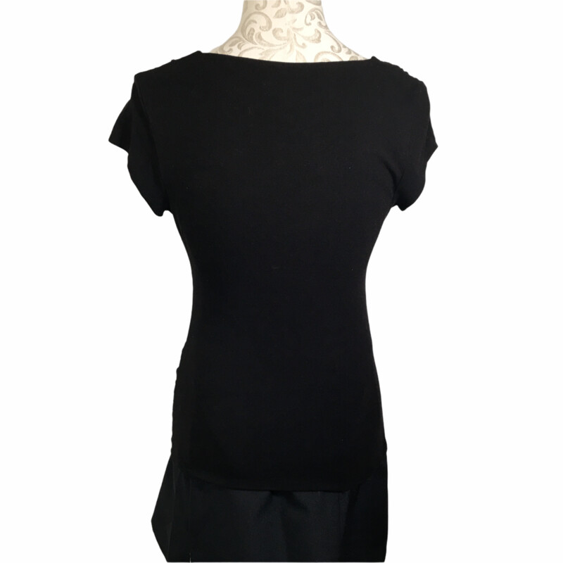 125-023 Cache, Black, Size: Large short sleeve black shirt with bow in the front 92% rayon 8% spandex  good