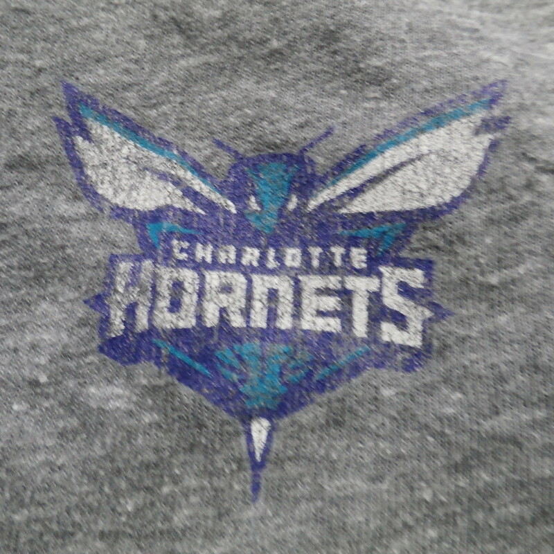 Adidas Charlotte Hornets Gray Men's Shirt Size Large Poly Blend #28894<br />
Rating:   (see below) 4- Fair Condition<br />
Team: Charlotte Hornets<br />
Player: Team<br />
Brand: adidas<br />
Size: Men's Large- (Chest 20\", length 26\" ;)<br />
Color: Gray<br />
Style: adidas Screen Pressed Shirt<br />
Material: 50% Polyester 37% Cotton 13% Rayon<br />
Condition: 4- Fair Condition- wrinkled; Pilling and Fuzz; Logos Worn Out visibility is fading;<br />
Item #: 28894<br />
Shipping: FREE