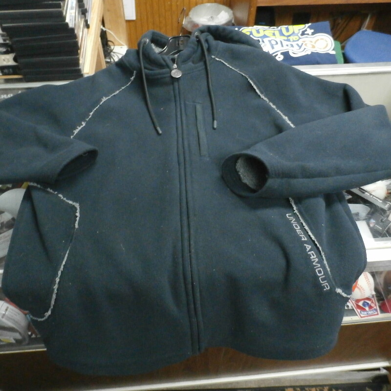 Under Armour Men's zip up Fleece style jacket black hooded Size Large poly 29064
Rating: (see below) 4- Fair Condition
Team: n/a
Player: n/a
Brand: Under Armour
Size: Men's Large (Measured Flat: chest 23\"; Length 29\")
Measured flat: armpit to armpit; top of shoulder to bottom hem
Color: Black
Style: Zip up; hooded; 2 front pockets; fleece style
Material: 100% polyester;
Condition: 4- Fair Condition: wrinkled; noticeable heavy fuzz or pilling with pet hair on the shell and the lining; heavy pilling and fabric balls in the pockets; fleece is matted down; noticeable fading and discoloration
Item #: 29064
Shipping: FREE