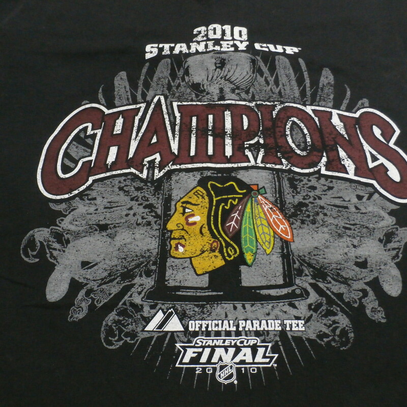 Chicago Blackhawks Men's T shirt black size missing 2010 Stanley Cup #27435
Rating: (see below) 3- Good Condition
Team: Chicago Blackhawks
Player: Team
Brand: Majestic
Size: Men's Missing Tags(Measured Flat: chest 21\"; Length 29\")
Measured flat: armpit to armpit; top of shoulder to bottom hem
Color: Black
Style: screen pressed; t shirt
Material: missing the tags
Condition: 3- Good Condition:  Wrinkled; feels course; white streaks on the interior of the shirt; pilling and fuzz
Item #: 27435
Shipping: FREE