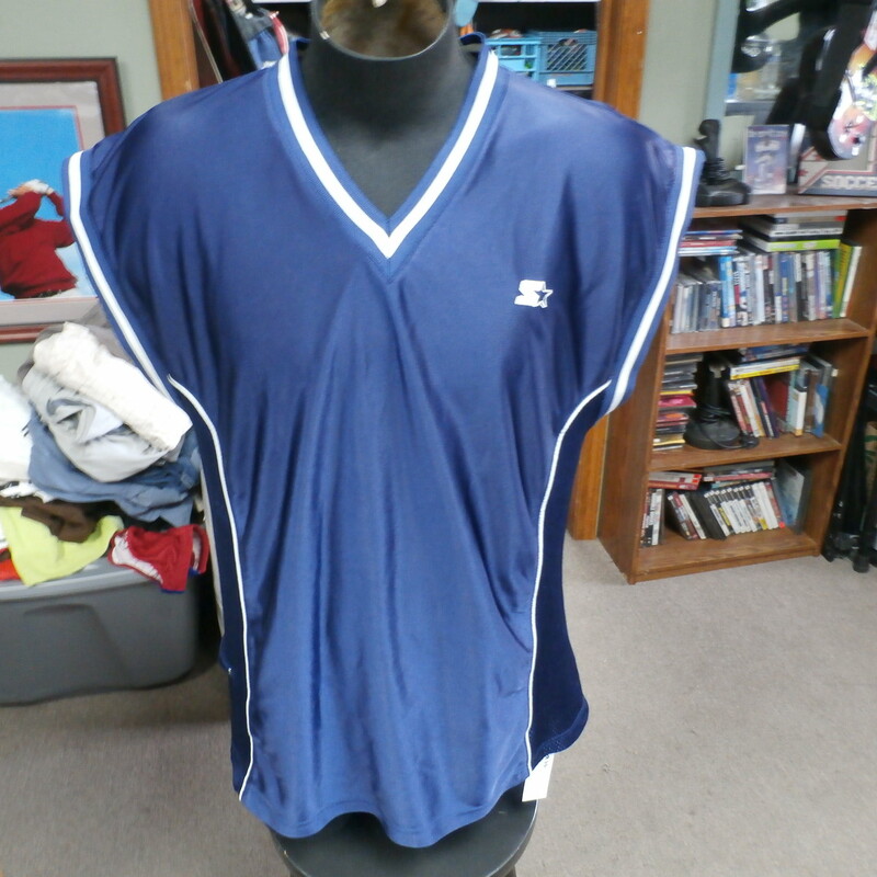 Starter basketball jersey blue size Large 100% polyester #29394<br />
Rating: (see below) 3- Good Condition<br />
Team: n/a<br />
Player: n/a<br />
Brand: Starter<br />
Size: Men's Large- (Measured Flat: Across chest 24\"; Length 30\")<br />
Measured Flat: underarm to underarm; top of shoulder to bottom hem<br />
Color: blue<br />
Style: sleeveless<br />
Material: 100% polyester<br />
Condition: 3- Good Condition: several small snags; minor wear from use; light fading mark on left shoulder (see photos)<br />
Item #: 29394<br />
Shipping: FREE