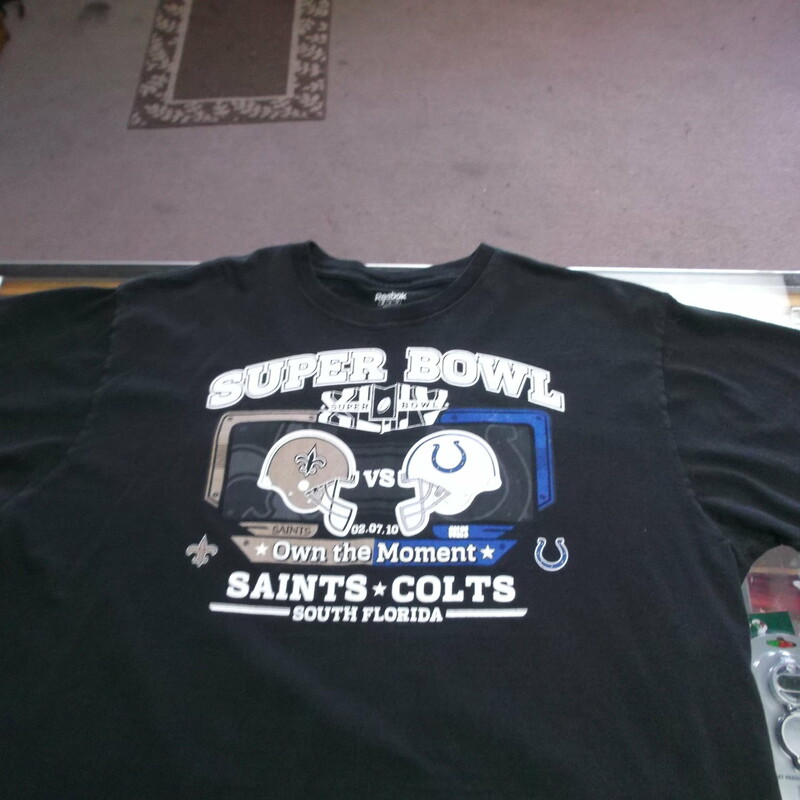 Saints VS Colts Superbowl XLIV South Florida Adult Reebok Shirt Size 2XL #8295
Rating:   (see below) 4 - Fair Condition 
Team: Saints VS Colts
Event: Super Bowl XLIV
Brand: Reebok 
Size: 2XL - Adult(Measured Flat: Across chest 25\"; Length 30\") Top of shoulder to the hem
Color: Black
Style: Screen pressed shirt
Material:100% Cotton
Condition: - Fair Condition - wrinkled; Material is faded and discolored; Significant pilling and fuzz; Material feels coarse; Material is stretched; Bottom is curled' Shows definite signs of use; No stains rips or holes(Please see the photos for condition and description) 
Shipping cost: $4.34
Item #: 8295