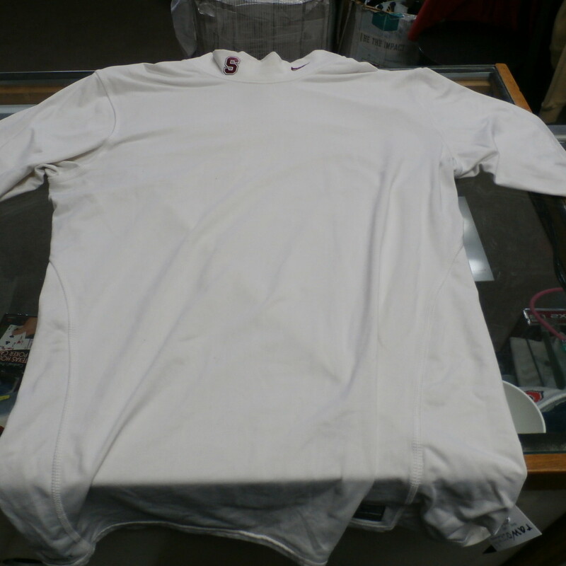 Stanford LS Shirt, White, Size: XL<br />
Nike Men's Stanford Cardinal long sleeve shirt white size XL 28711<br />
Rating: (see below) 4- Fair Condition<br />
Team: Stanford Cardinal<br />
Player: N/A<br />
Brand: Nike<br />
Size:  Men's XL  (Measured Flat: Across chest 19\"; Length 28\")<br />
Measured Laying Flat: armpit to armpit; top of shoulder to bottom hem<br />
Color: White<br />
Style: Long sleeve shirt; Screen pressed<br />
Material: 100% Polyester<br />
Condition: 4- Fair Condition: wrinkled; pilling and fuzz; discoloration from use; some light staining on front and sleeves; staining on collar;<br />
Item #: 28711<br />
Shipping: FREE