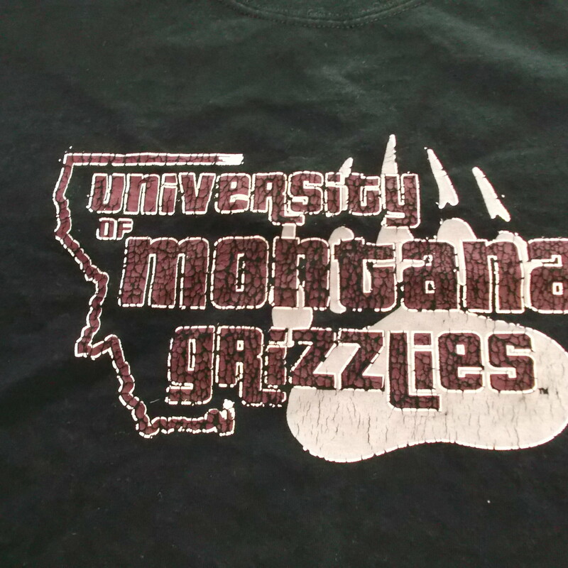 Montana Grizzlies Men's Gildan Short Sleeve Shirt Size XL Black Cotton #8550
Rating:   (see below) 4 - Fair Condition
Team: Montana Grizzlies
Player: N/A
Brand: Gildan
Size: XL - Men's(Measured Flat: Across chest 22.5\"; length 30\") 
Color: Black
Style: Short sleeve screen pressed shirt
Material: 100% Cotton
Condition: - Fair Condition - wrinkled; Material is faded and discolored; Material feels coarse; Significant pilling and fuzz; Logo is cracked and worn; Bottom is curled; light stretched; Definite signs of use(See Photos for condition and description)
Shipping: $4.20
Item #: 8550