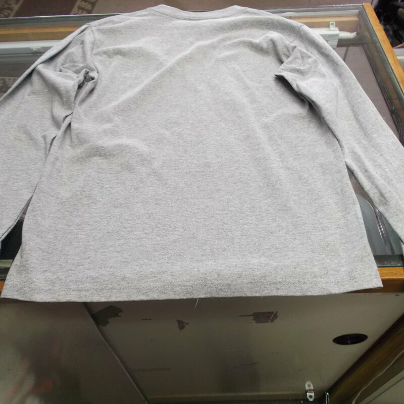 Montana Grizzlies YOUTH Anvil Long Sleeve Shirt Size Large Gray #8267<br />
Rating:   (see below) 3 - Good Condition<br />
Team: Montana Grizzlies<br />
Player: N/A<br />
Brand: Anvil<br />
Size: Large - YOUTH(Measured Flat: Across chest 17\"; length 25\") <br />
Color: Gray<br />
Style: Long sleeve screen pressed shirt<br />
Material: 90% Cotton 10% Polyester<br />
Condition: - Good Condition - wrinkled; Pilling and fuzz is present; Material feels coarse; Front part of the left side of the collar is stained; Definite signs of use; Logo looks great; No rips or holes(See Photos for condition and description)<br />
Shipping: $3.37<br />
Item #: 8267 