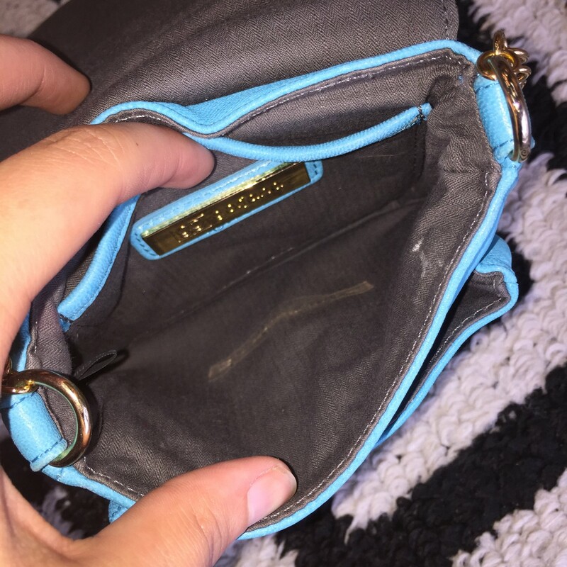 Gorjana crossbody bag with chain strap. Aqua blue soft leather with gold hardware. Great condition with few spotting. Retail: $199