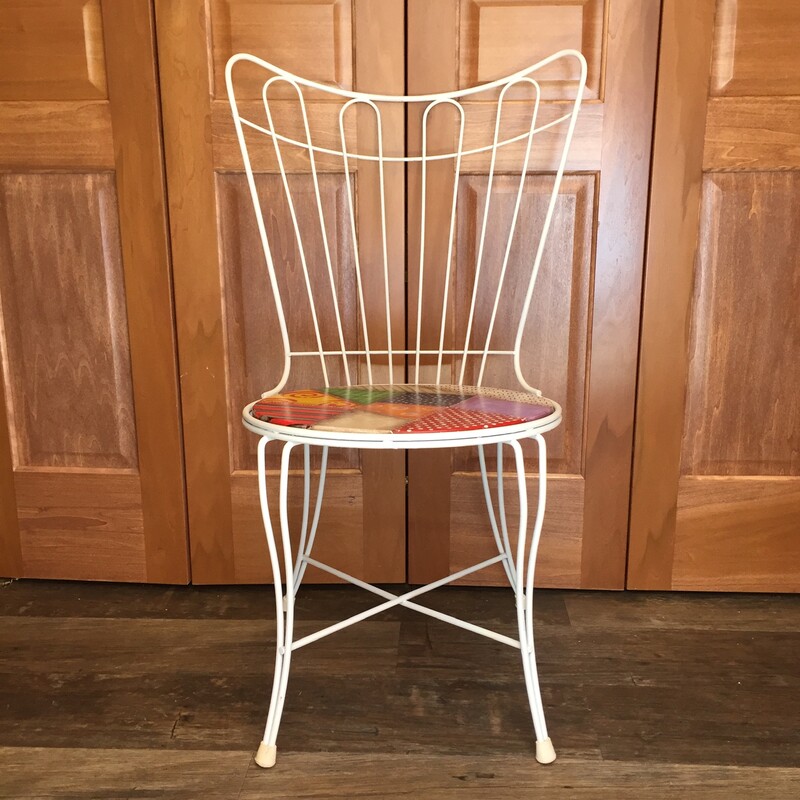 RETRO DINING CHAIR<br />
HAND PAINTED TO THE EXTREME...<br />
<br />
H: 33 INCHES    W: 16.5 INCHES<br />
<br />
INSTORE PICK UP OR WILL COORDINATE SHIPPING