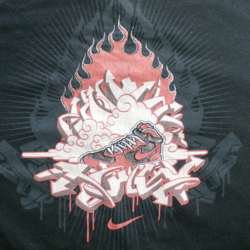 Nike graffiti sneaker black graphic ringer T-shirt size 2XL #31242
Rating: (see below) 3- Good Condition
Team: n/a
Player: n/a
Brand: Nike
Size: Men's XXLarge- (Measured Flat: Across chest 25\"; Length 33\")
Measured Flat: underarm to underarm; top of shoulder to bottom hem
Color: black
Style: short sleeve; screen printed
Material: tag missing
Condition: 3- Good Condition: minor wear and fading from use and washing; some tiny cracks in screen printing (see photos)
Item #: 31242
Shipping: FREE