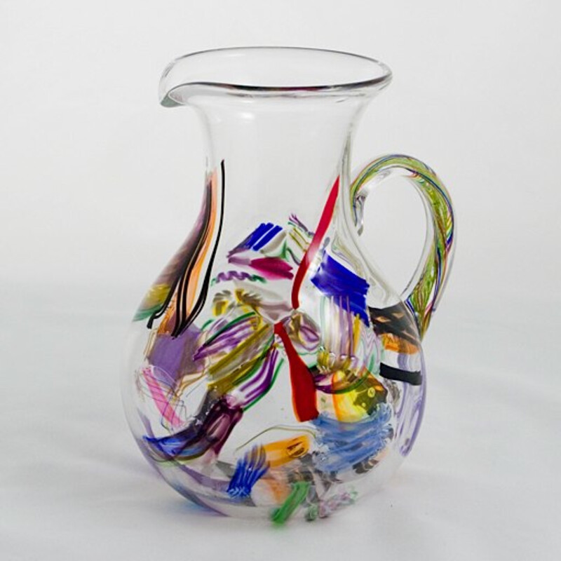 The Cane-fetti Pitcher and (4)Tumblers are made using the highest quality cane coloration. These colorful hand-blown cane accents are pre-made and carefully applied to each pitcher and tumbler. This unique design process creates completely original works of art in every piece.

Pitcher: 7inw x 10inh
Tumbler: 3inw x 5.5inh