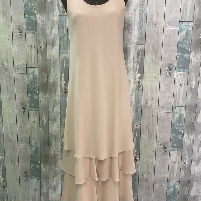 JC Collections 2 Pc Formal<br />
Sheer 100% polyester dress with long flowy jacket<br />
Ruffle at the hemline, 3/4 length<br />
Tan<br />
Size: Medium
