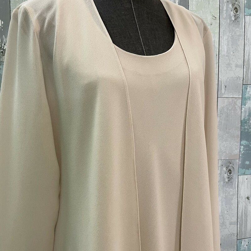 JC Collections 2 Pc Formal<br />
Sheer 100% polyester dress with long flowy jacket<br />
Ruffle at the hemline, 3/4 length<br />
Tan<br />
Size: Medium