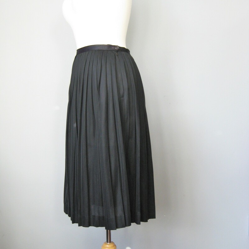 Super simple pleated skirt by Sacony<br />
I am calling it 60s because of the vinyl zipper and the look of the label but other garments that I've handled from this brand are all earlier<br />
It doesn't have any fabric labels but it feels like nylon<br />
It's got a defined waistband, zipper closure and it's pleated all the way around<br />
Very sheer, so you will need a sliip or bike shorts underneatch<br />
Excellent condition!<br />
The hem is turned up 2in so if you need to lengthen it you can get another 1.5in.<br />
Here are the flat measurements, please double where appropriate:<br />
Waist: 13.5in<br />
Hip: free<br />
Length: 27in<br />
<br />
Thanks for looking!<br />
#38020