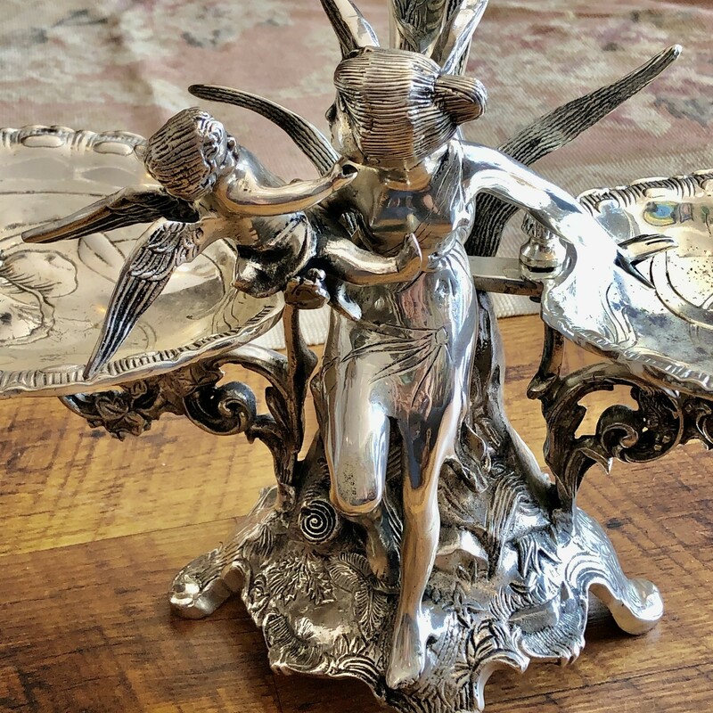 Beautiful Jugendstil Style Silver Plated Epergne<br />
c.1900-1940. A unique piece that is as functional as it is beautiful.<br />
Measure 21in tall x 19.5in wide x 7in deep and weights approx. 22 lbs.<br />
<br />
Shipping will be USPS priority mail.