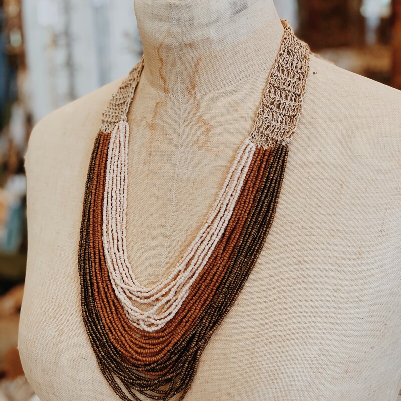 Who else absolutely loves earth tones? The earthy blush, rust, and olive colors on this necklace are to die for!