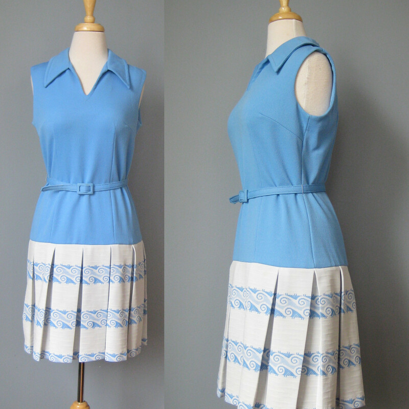 Darling day dress from the 1970s.
No tags, poly double knit
The dress is in the prettiest shade of sky blue and features a drop waist, flared pleated skirt and collar v neckline and a thin matching belt

The print on the skirt are adorable waves with a precise and controlled vibe.

Flat measurements:
armpit to armpit: 36.5in
waist: 16in
hip: 17.5in
length: 36.5in

the belt is labeled size 10 which would be about a modern size 4

excellent condition.
thanks for looking!
#401821