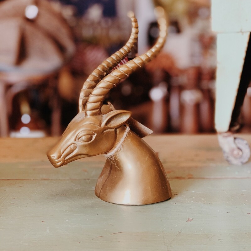 This brass ram head measures 8.5 inches tall and 4 inches wide. Such a great decor piece!
