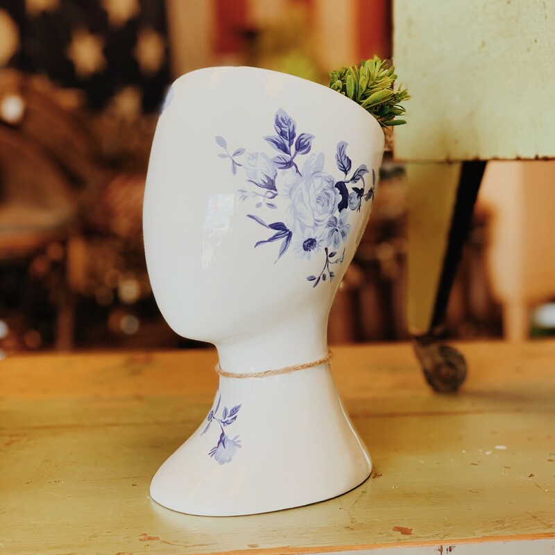 Such a unique vase, and it is so beautiful paired with any florals you can find here at Resurrect!