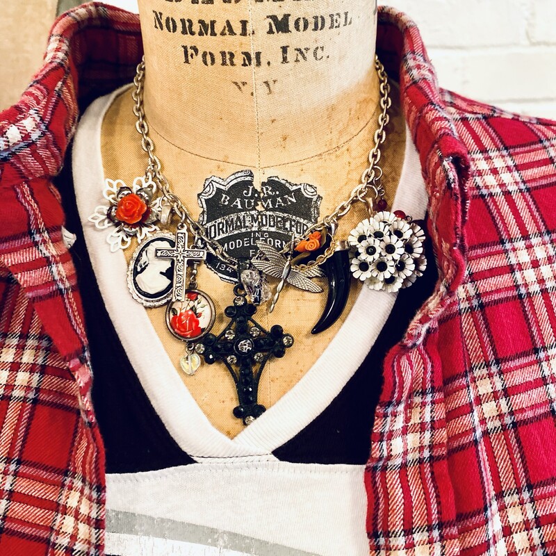 This is the perfect way to show your Falconâ€™s team spirit. This necklace is made with red; white and black vintage pieces. Itâ€™s a one of a kind piece and definitely a conversation piece.