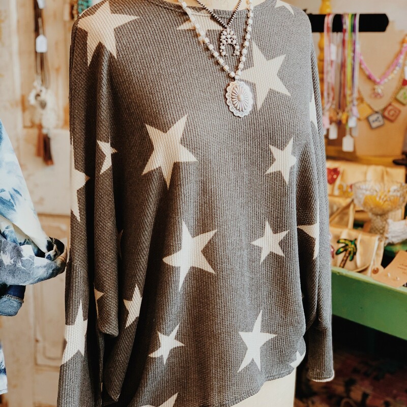 Such an adorable olive colored shirt with stars!