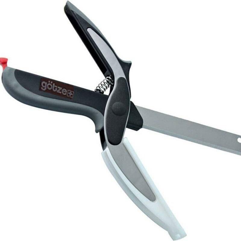 Gotze 2 In 1 Knife/Scizzor<br />
<br />
The Götze 2-in-1 Knife Scissors are the ultimate kitchen companion for chefs and at-home cooks alike. Combining the power of a cutting board and a stainless steel knife, its design makes it easy to achieve precise slices and effortless chopping...even butternut squash are no match for our premium knife. Whether you’re making a feast or cutting up a quick snack, The Götze 2-in-1 Knife Scissors are a real game-changer.