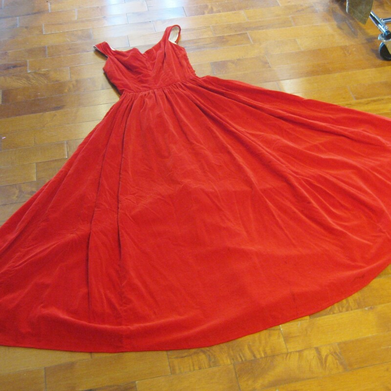 Velvet Gown AS IS, Red, Size: None
Super pretty princess dress for dress up or costumes  for a slim teen girl.
It's from the 60s and it's made of luxed red velvet
Sweet hear neckline
Fitted sleevless bodice
Super full skirt.

This dress is offered as is at this price.  It has some stains on the lower part of the skirt, also there is a tear in the fabric under the arm, which could be repaired but it would probably be noticeable.

Made in the USA

It is marked size 2, which is probably a bit smaller than a modern size two.
flat measurements:
armpit to armpit: 17in
waist: 12in
hip: free
length: 54.5in
#6765