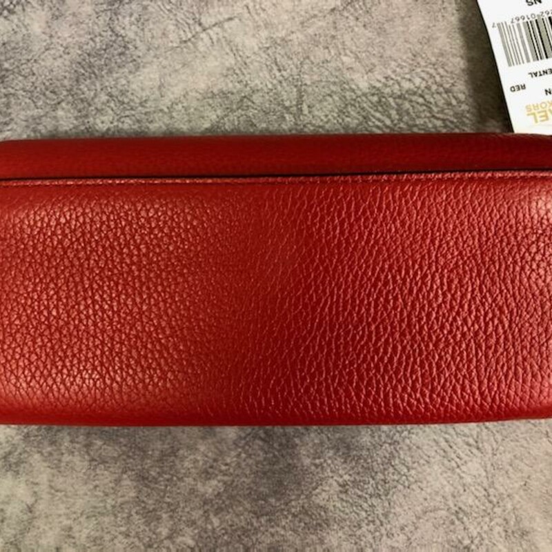 Michael Kors Leather Wallet<br />
FULTON - Red Flap Continental<br />
Original Retail Price:  $178.00<br />
 Gorgeous pebbled leather<br />
* Polished silver tone hardware<br />
* Flap style snap closure<br />
* Open slip pocket on the back<br />
* Interior features zippered coin compartment, 14 card slots, and 4 full length bill compartments<br />
* Measures approximately 7.75\" (L) x 4\" (H) x 1\" (W)<br />
This wallet is Brand New with Tags