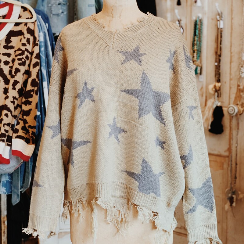 These sweaters are a fall staple! They are a fabulous thick material with a star pattern!