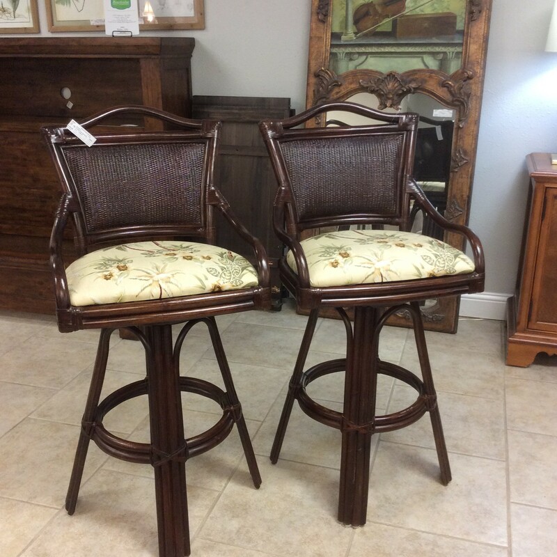 This pair of rattan/bamboo indonesian barstools are a dark brown with very pretty hawaiian print seats.
They are 31\" tall