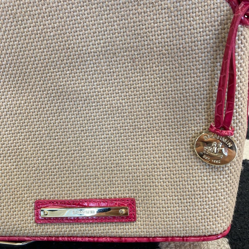 Brahmin Crossbody: This cute crossbody can come with you anywhere! Add a bit of pink and a lot of style to your outfit. Small size.  No signs of use.